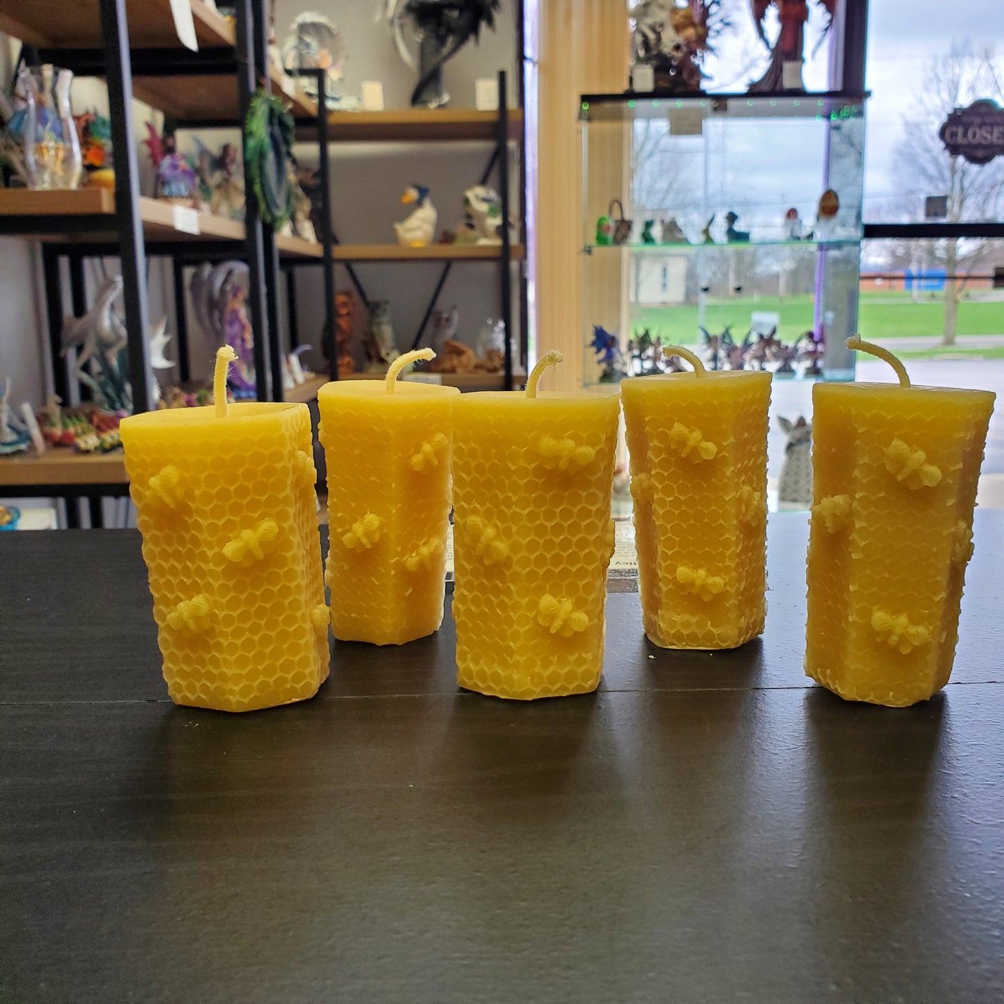 Pure beeswax honeycomb candles with textured design, perfect for natural ambiance