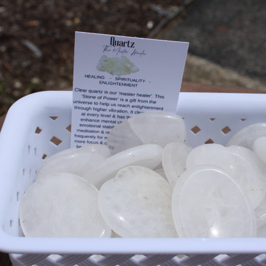 Clear Quartz Worry Stone polished smooth in white basket by Different Branches LLC