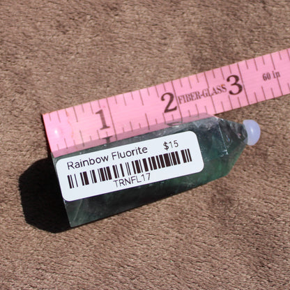 Rainbow Fluorite tower in green and purple hues for crystal enthusiasts or healing practices