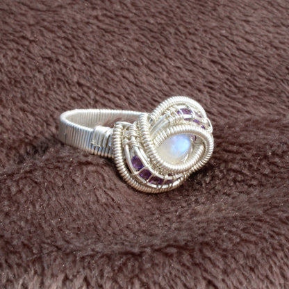Rainbow moonstone and amethyst sterling silver ring with intricate wire wrap design