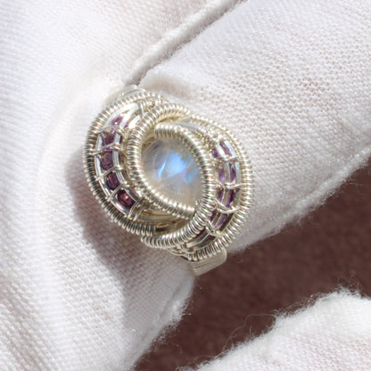 Rainbow moonstone and amethyst sterling silver ring with intricate wire design and sparkling gems