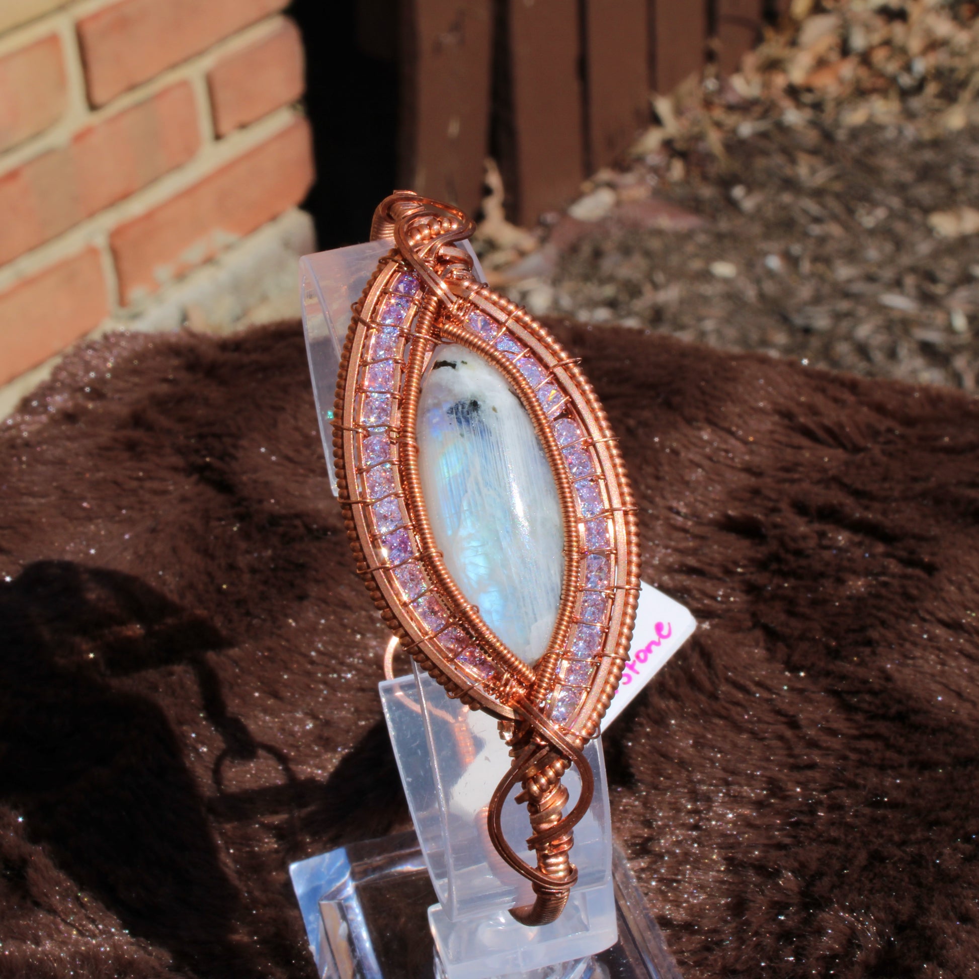 Rainbow moonstone cz bracelet with a unique wire design and shimmering crystals for elegant style