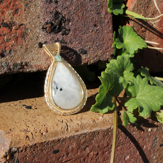 Rainbow moonstone Sterling Silver, 14k Gold Fill pendant with intricate design set against natural stones