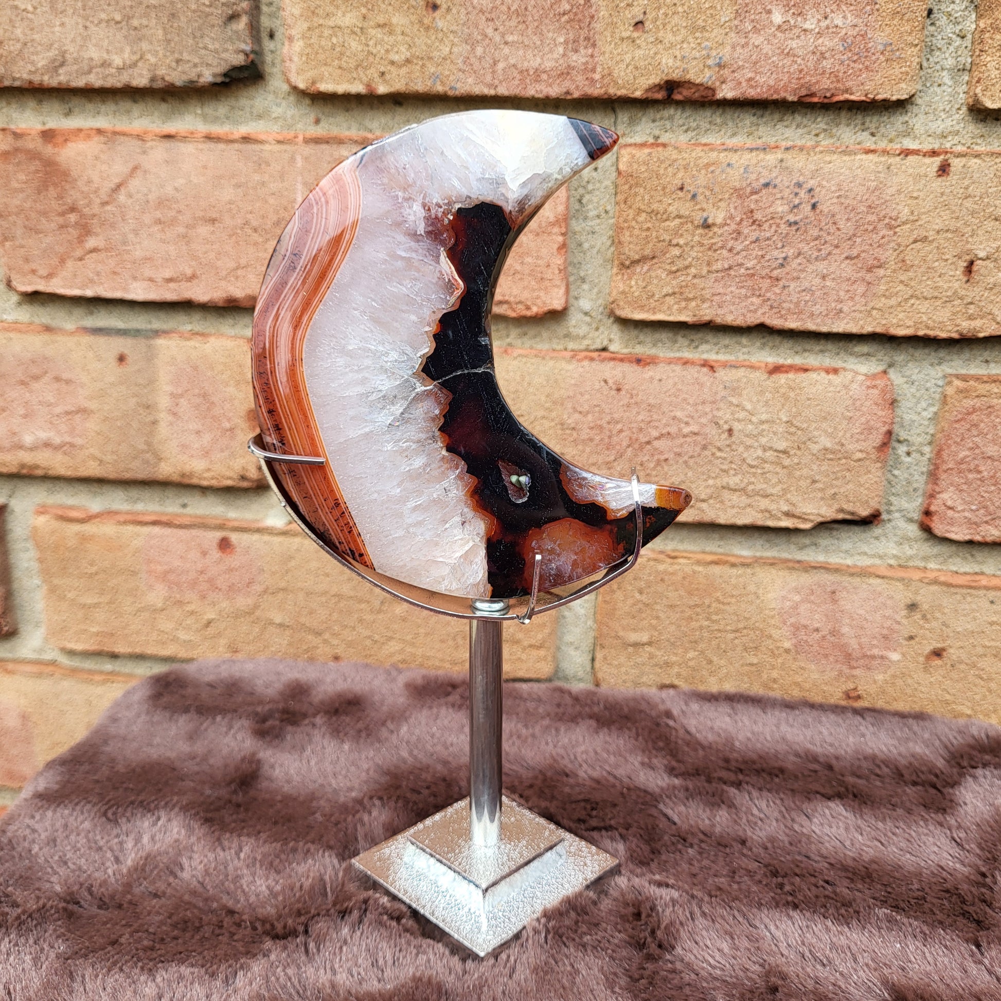 Red Agate Moon Decorative Sculpture on Stand with Unique Patterns and Colors for Home Decor