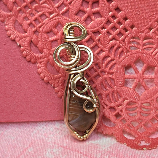 Handcrafted Pendant with Red Agate Stone Wrapped in Elegant Gold Wire Design