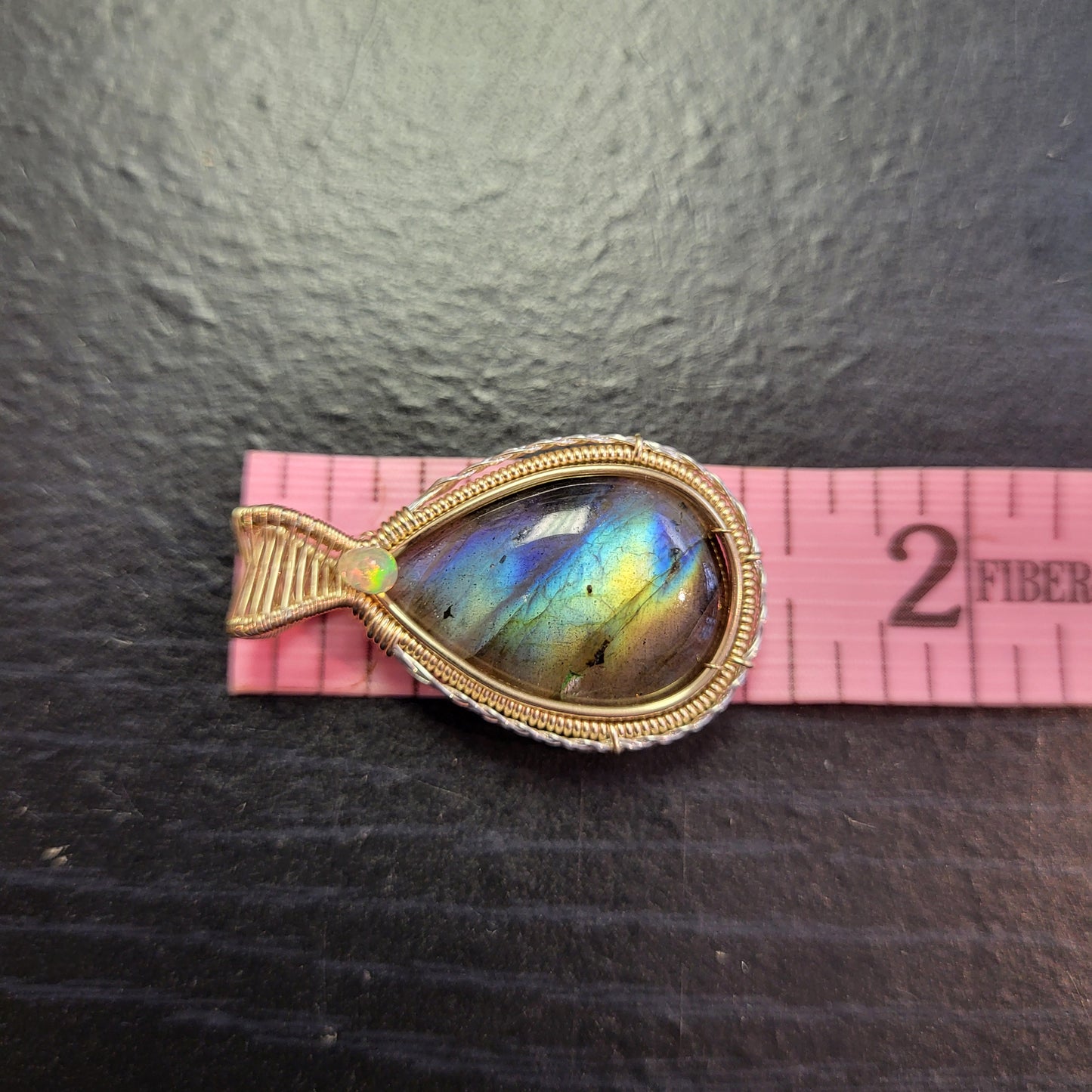 Labradorite 14k Gold Fill and Sterling Pendant featuring vibrant hues and an elegant design