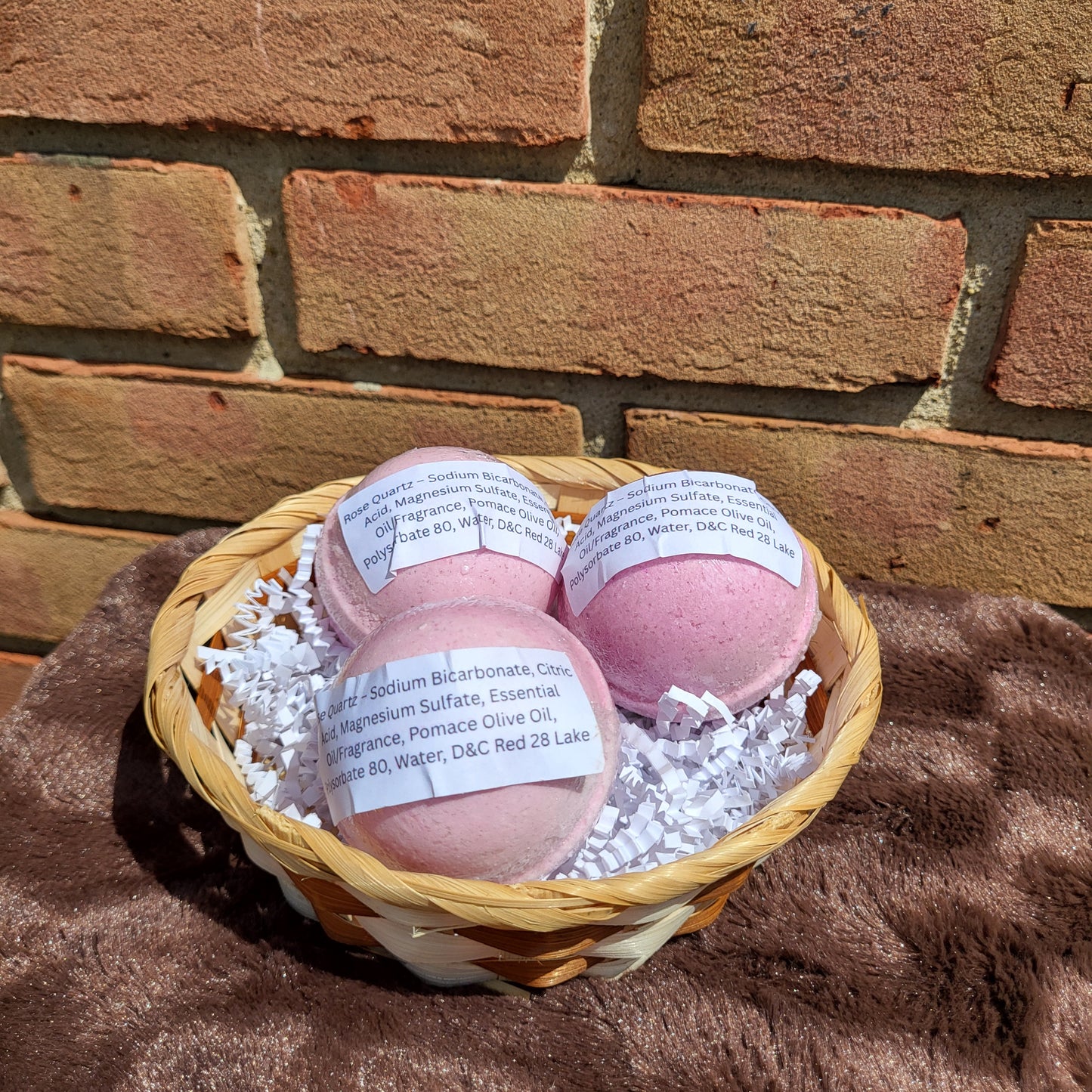 Basket of Made Natural Rose Quartz Bath Bombs with Natural Ingredients and Soft Pink Color
