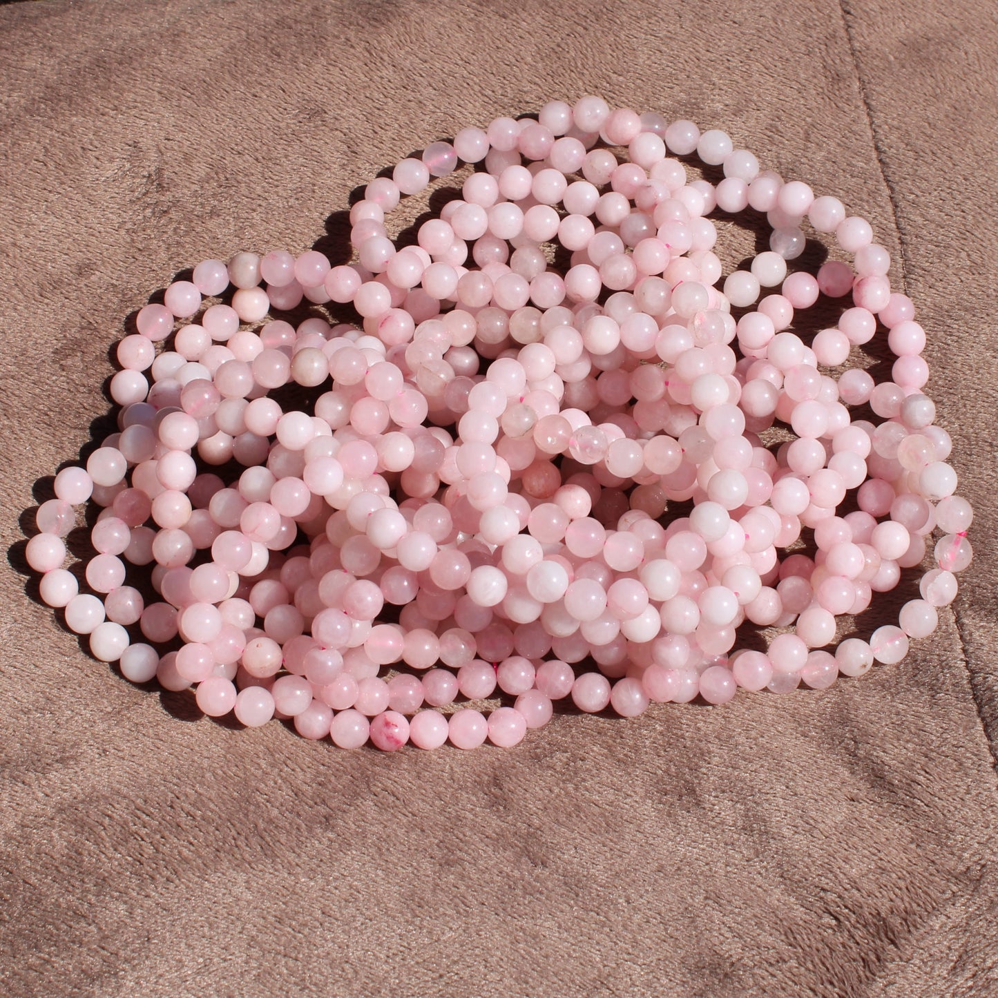 Rose Quartz Bracelet strands in soft pink hues for jewelry making and fashion accessories