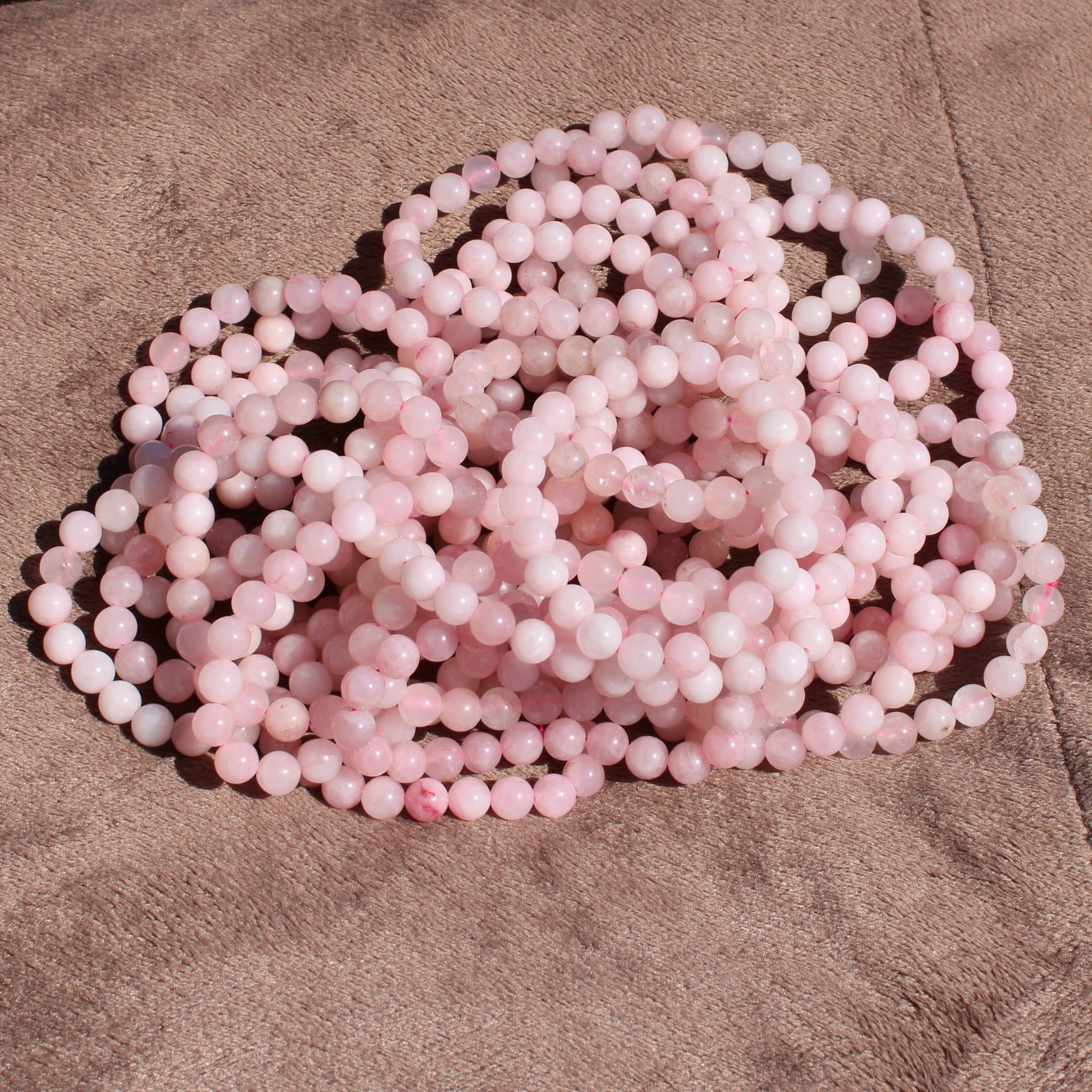Rose Quartz Bracelet strands in soft pink hues for jewelry making and fashion accessories