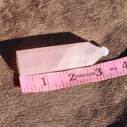Rose Quartz tower with a smooth surface, ideal for healing and home decor