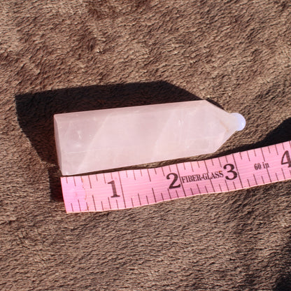 Rose Quartz tower with a smooth finish, ideal for crystal healing and meditation