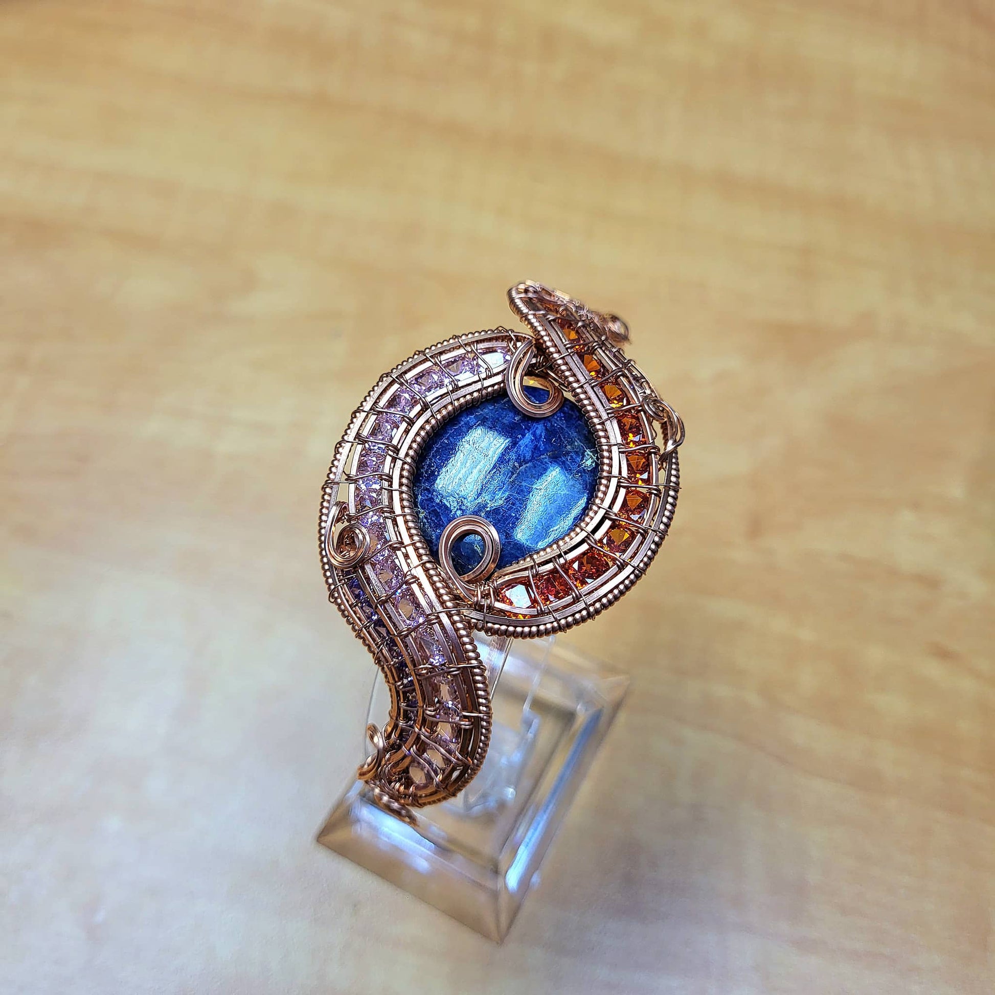 Sodalite raw copper bracelet with intricate wire design and vibrant blue stone, handcrafted by Different Branches