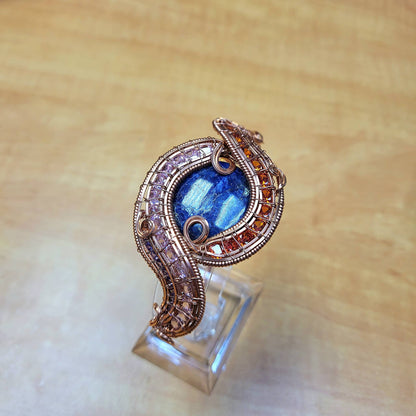 Sodalite raw copper bracelet with intricate wire design and vibrant blue stone, handcrafted by Different Branches