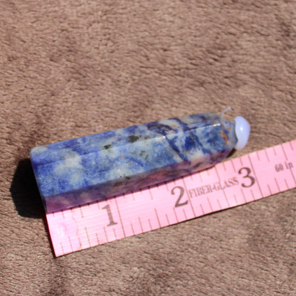 Sodalite tower crystal with deep blue hues, perfect for meditation and energy work