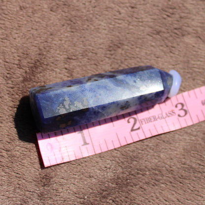 Sodalite tower crystal with natural blue hues and unique patterns for healing and decor