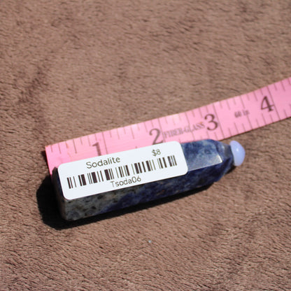 Sodalite tower with natural blue hues, perfect for crystal collectors and decor enthusiasts.