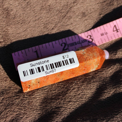 Sunstone tower by Different Branches LLC with vibrant orange hues, measuring 3 inches in length