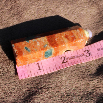 Natural Sunstone tower with orange and green flecks, perfect for crystal healing and decor