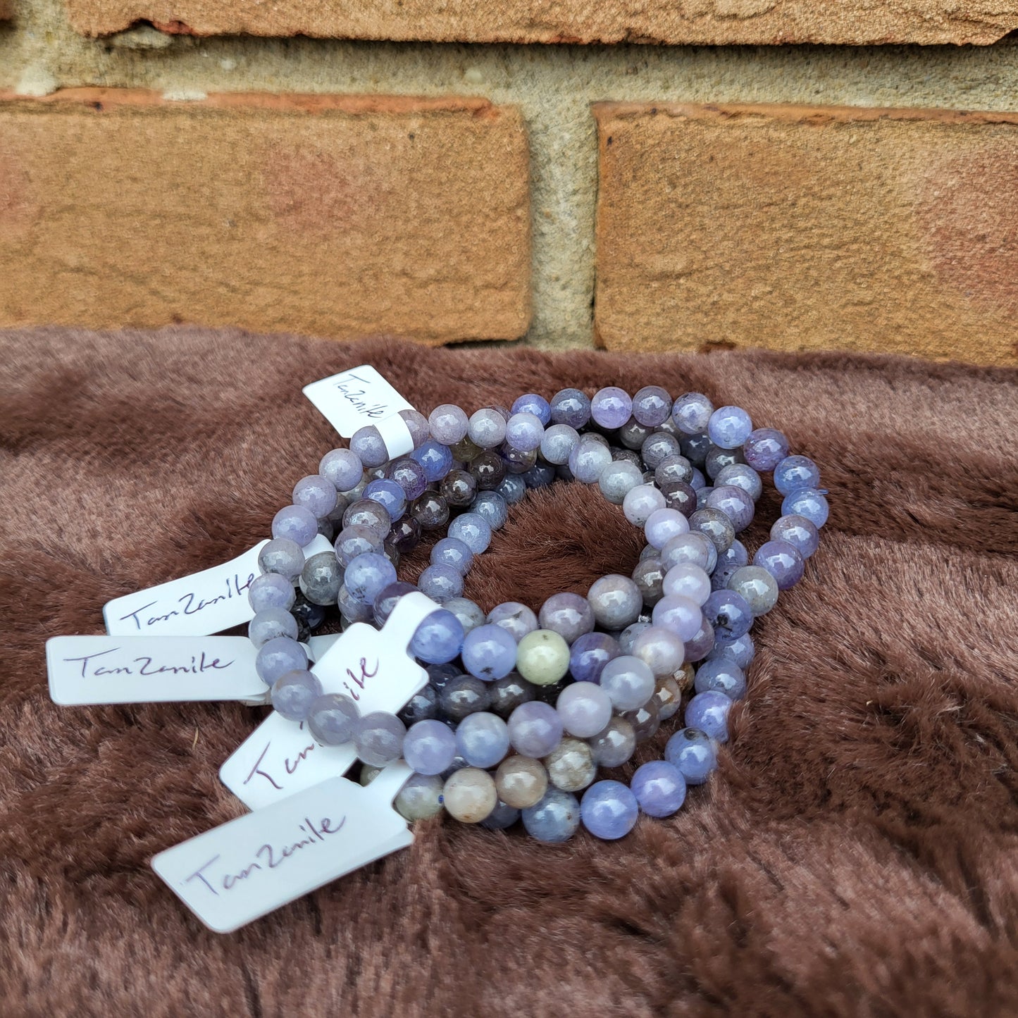 Set of Tanzanite bracelets featuring unique shades of purple, perfect as a stunning gift or personal accessory