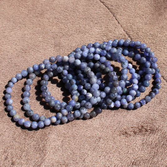 Elegant Tanzanite Bracelet featuring round beads in various shades of blue, perfect for everyday wear