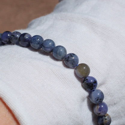 Elegant Tanzanite Bracelet made with smooth beads, showcasing rich blue hues and natural variations
