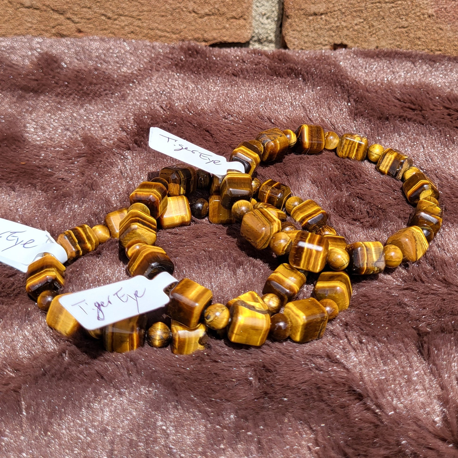 Tiger eye cube bracelet featuring polished yellow and brown stones for a stylish accessory