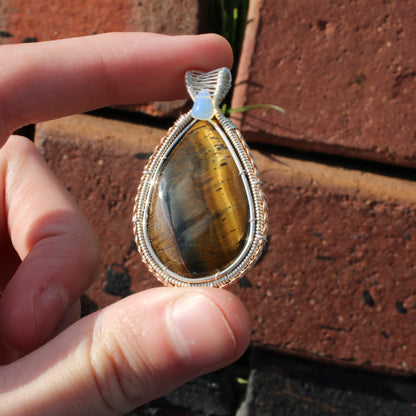 Tiger eye, Ethiopian opal sterling silver pendant beautifully wrapped in intricate wire design