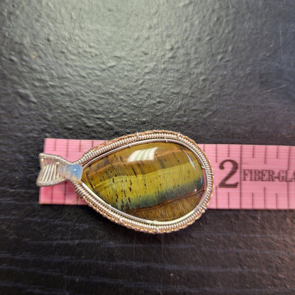 Tiger eye, Ethiopian opal sterling silver pendant with a unique polished finish and intricate design