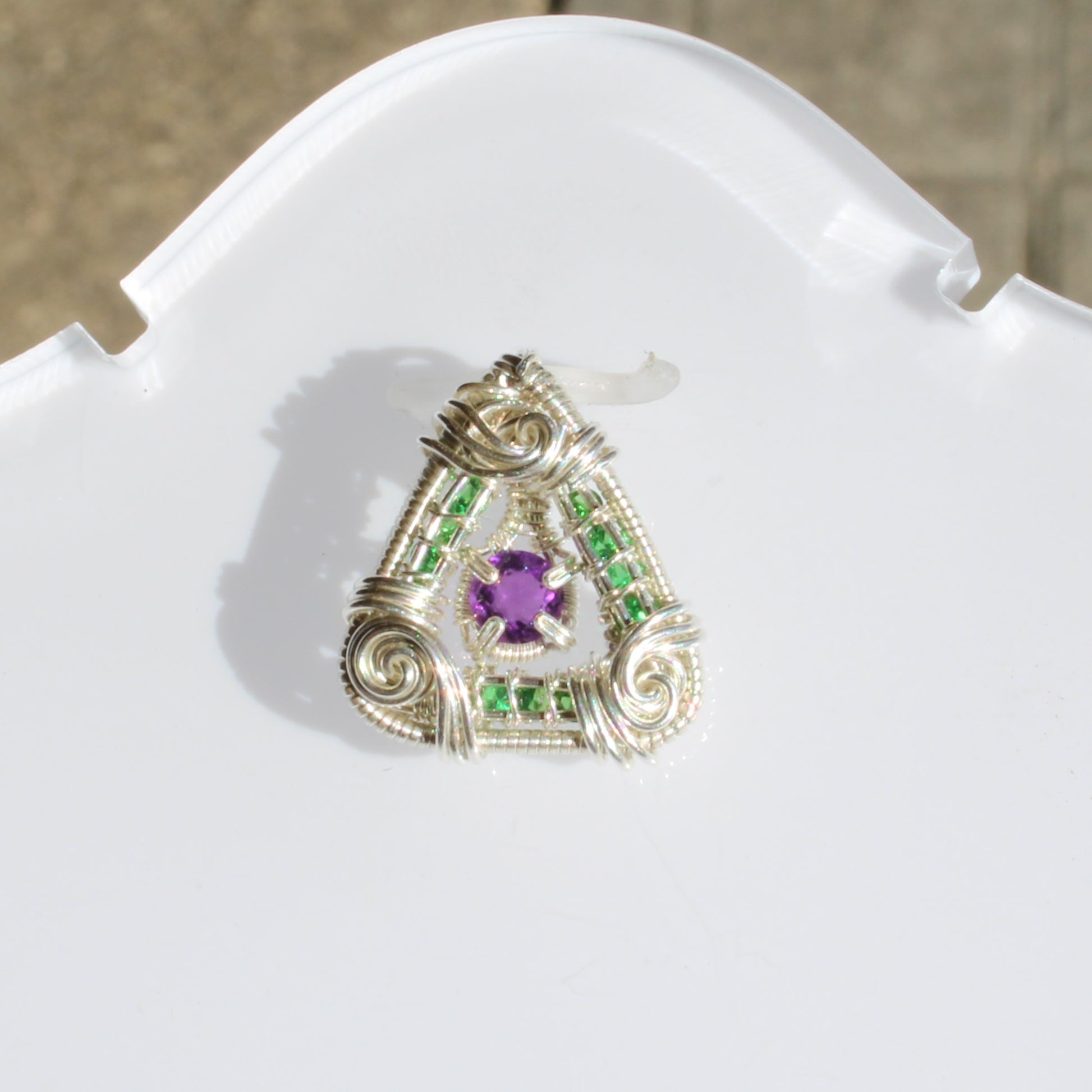 Handcrafted jewelry featuring Tsavorite and amethyst set in sterling silver for a unique design