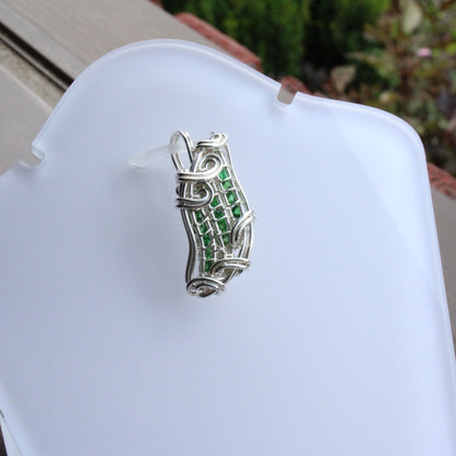 Tsavorite Sterling silver Pendant featuring an intricate wire design and vibrant green gemstones