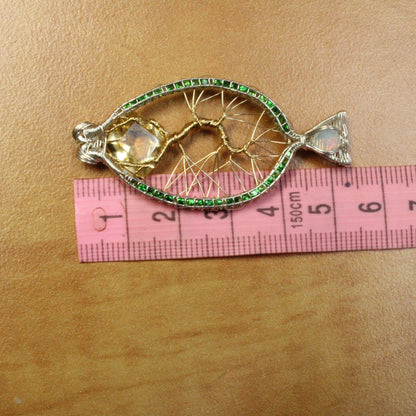 Tsavorite tree of life pendant crafted with intricate design and sparkling stones